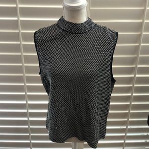 St. John knit navy & white top. zipper at shoulder